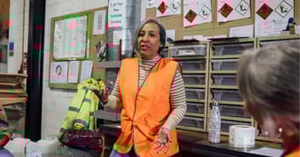 Supervisor speaking with employees about safe working practices, reflecting why health and safety is important at work.