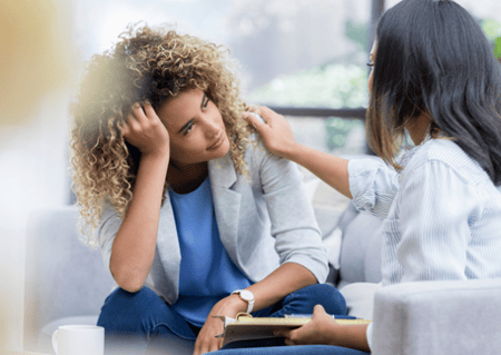 Image of colleague supporting the wellbeing of another colleague