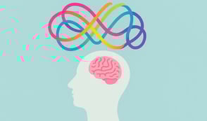 Landscape illustration of a pale white head silhouette with a pink brain, with a flowing rainbow infinity symbol above representing neurodiversity, set on a plain teal background.