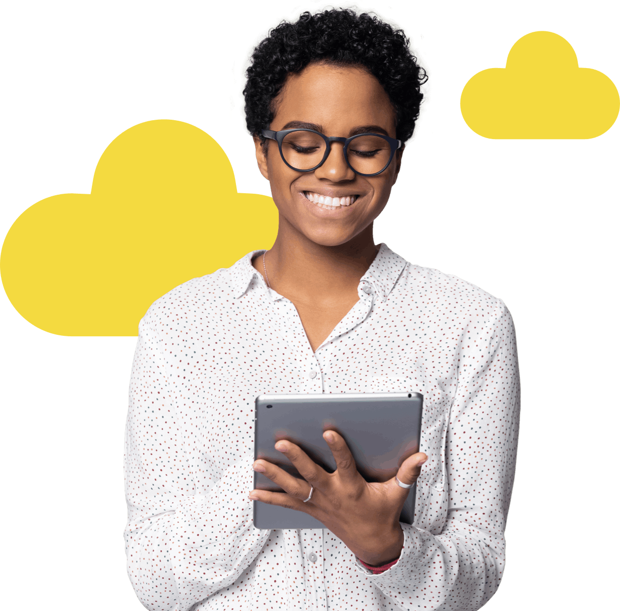 Lady wearing a white shirt smiling at the tablet she is holding 