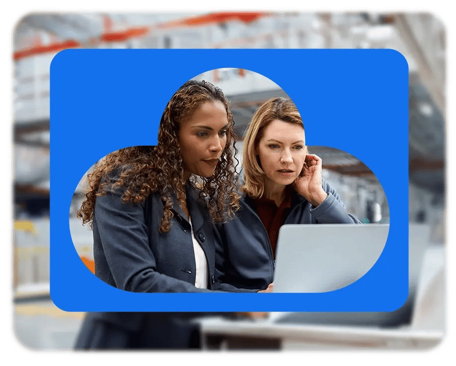 Hero image - women looking at laptop in warehouse