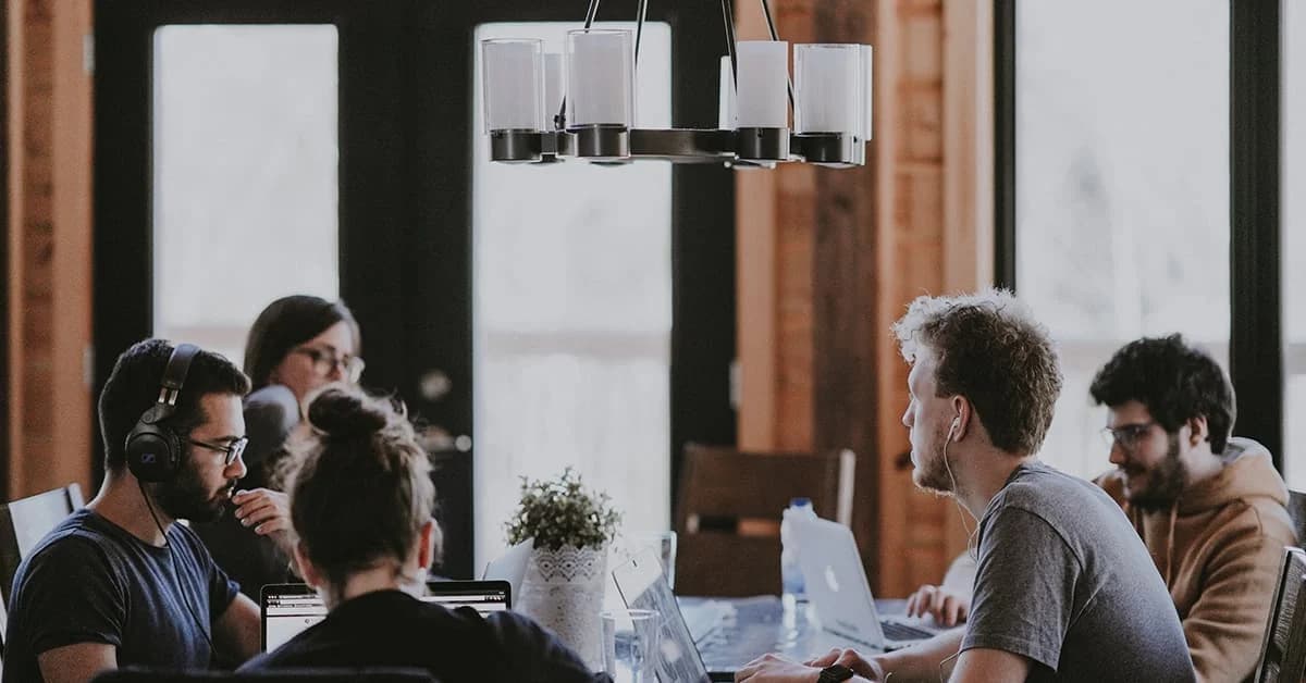 Employees working at a table