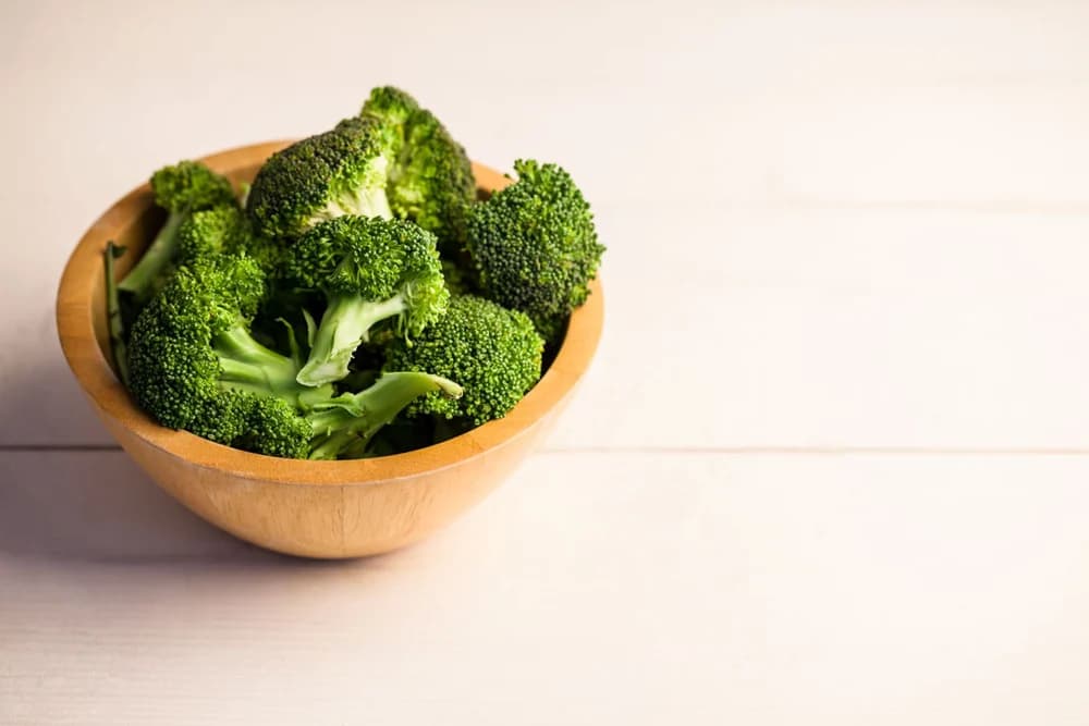 Wooden bowl of healthy broccoli