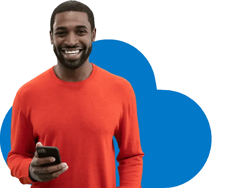 January_campaign_homepage_smiling_man_looking_at_the_camera_holding_phone_2 (1)
