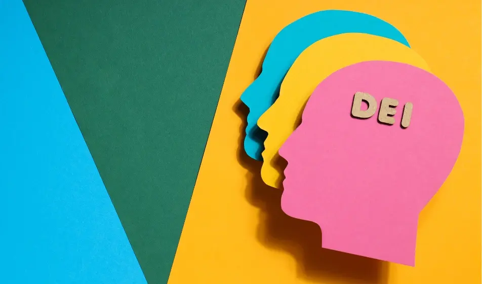 Background in blue, green, and yellow triangles. On the right, overlapping head outlines: blue, yellow, and pink (front) with "DEI" on the pink head