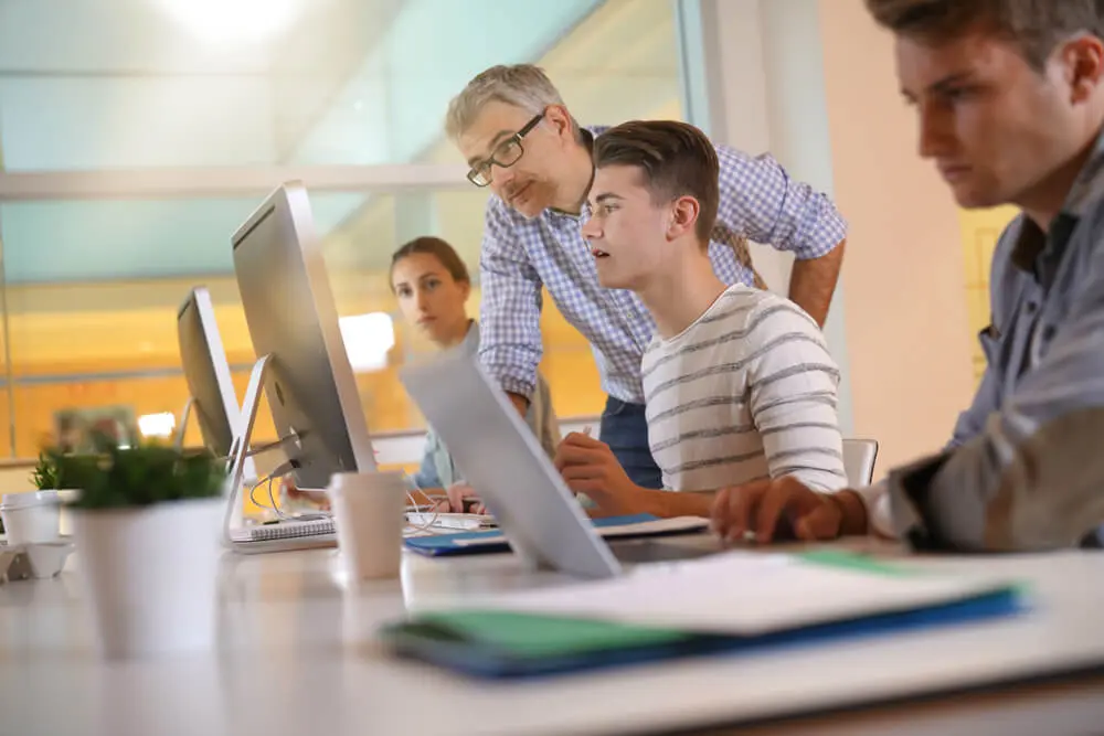 apprentice_student_teacher_desk_officeshutterstock_1034507155 (1) (1) (1)